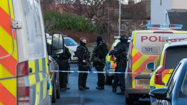 Man, 21, arrested after armed officers attend disturbance