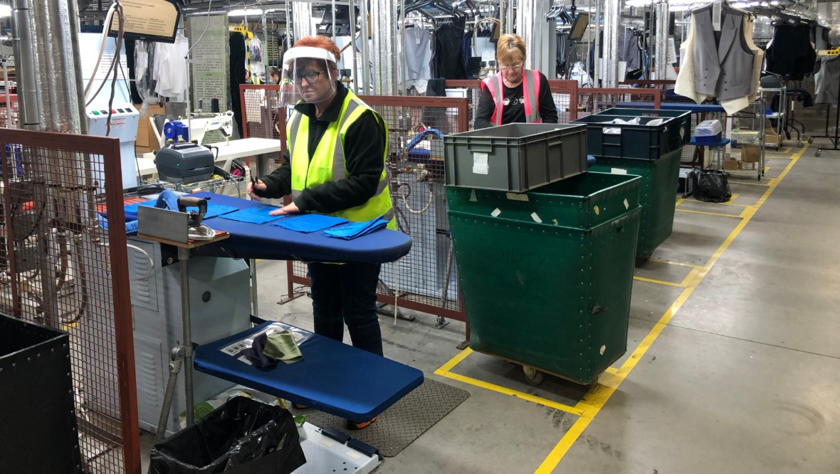 Warehouse: Workers help to repair and clean clothes.