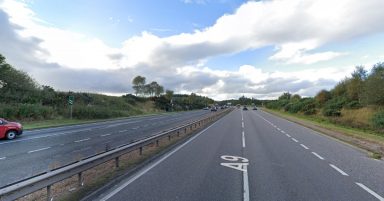 Road closed for several hours after woman dies in single-car crash