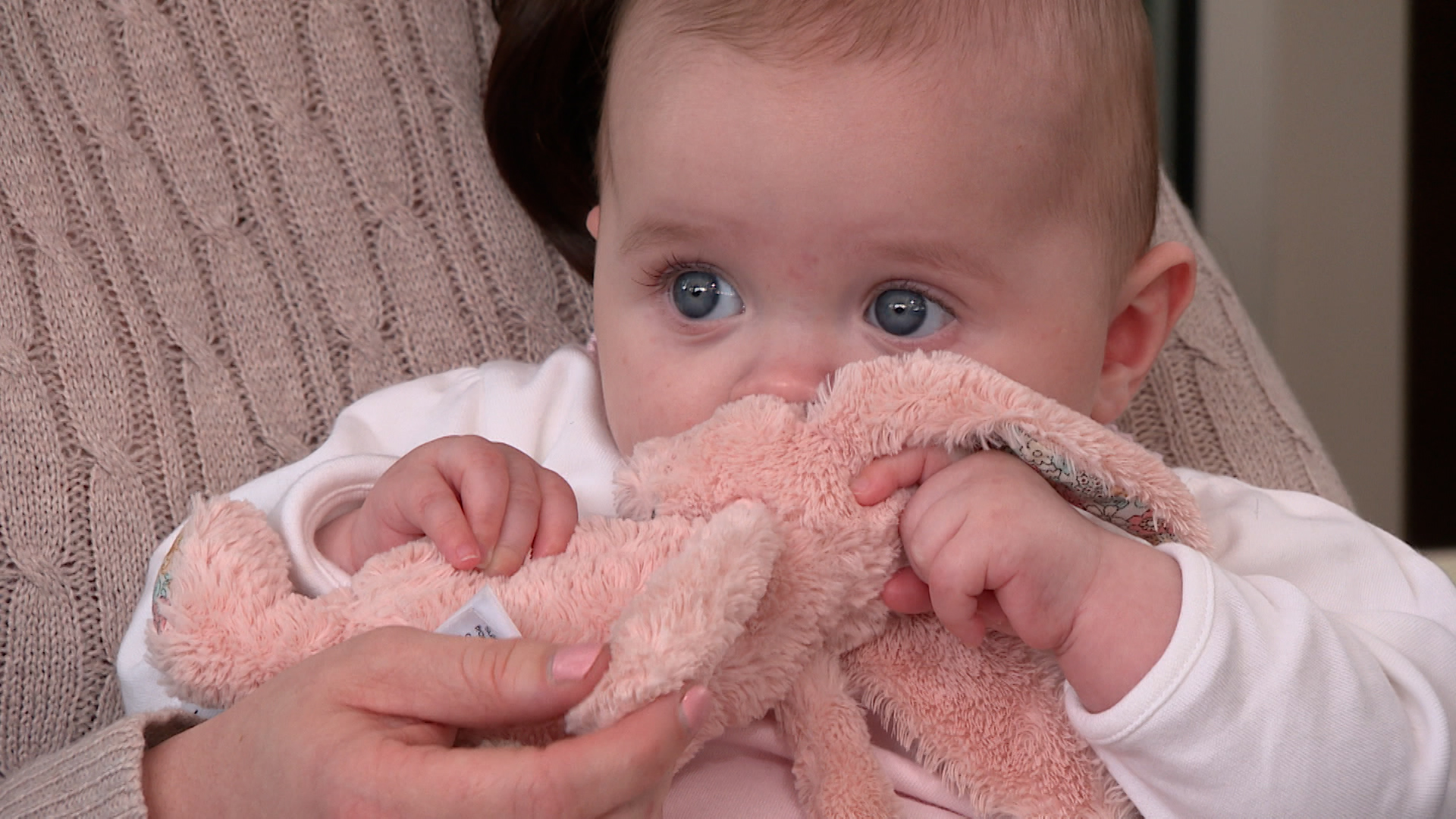 Baby Eliana is at home with mum and dad Sam and Niomi Allen after being carried by a surrogate.