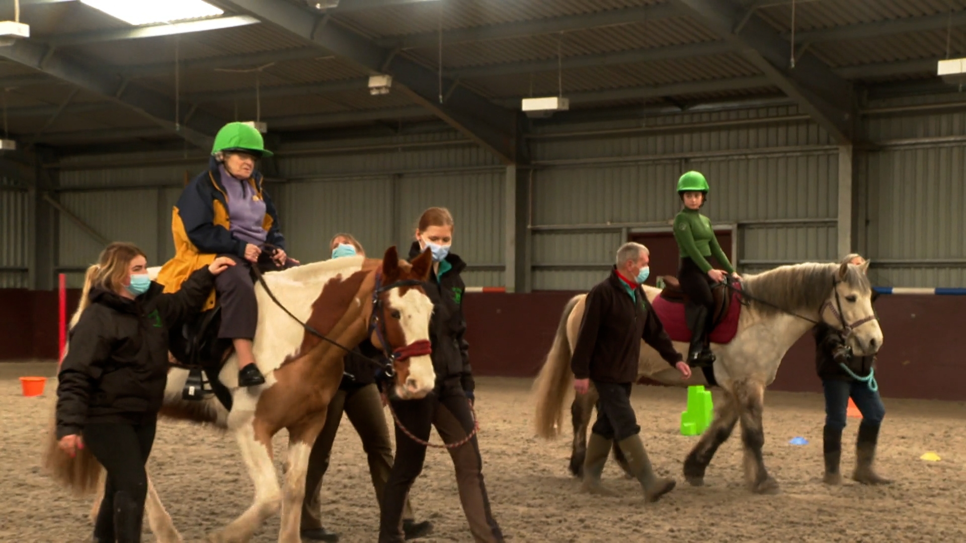 Millis Thompson riding alongside great-granddaughter Amelie