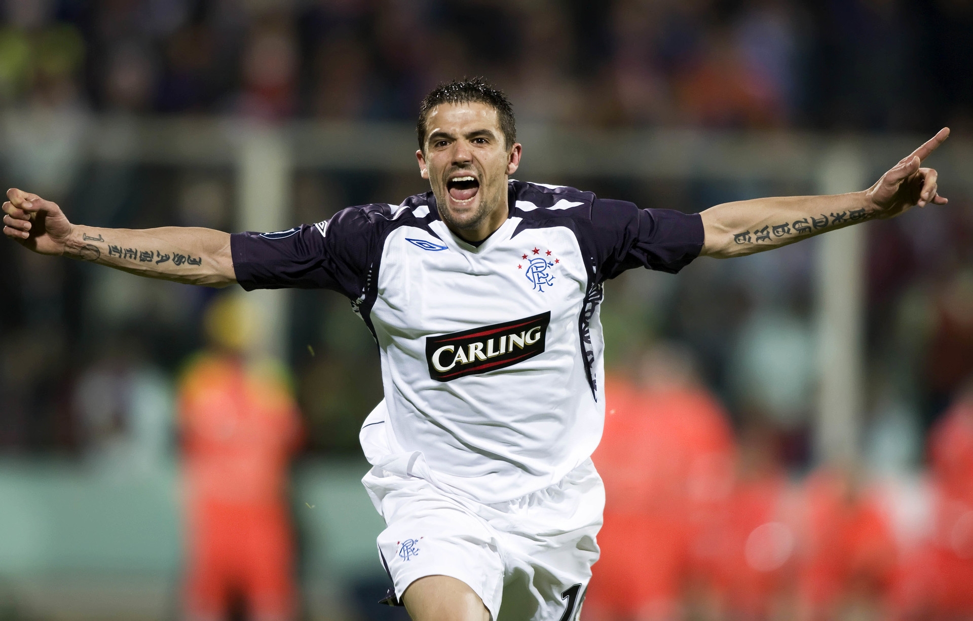 Nacho Novo sends the Rangers fans into a frenzy after slotting home the winner.