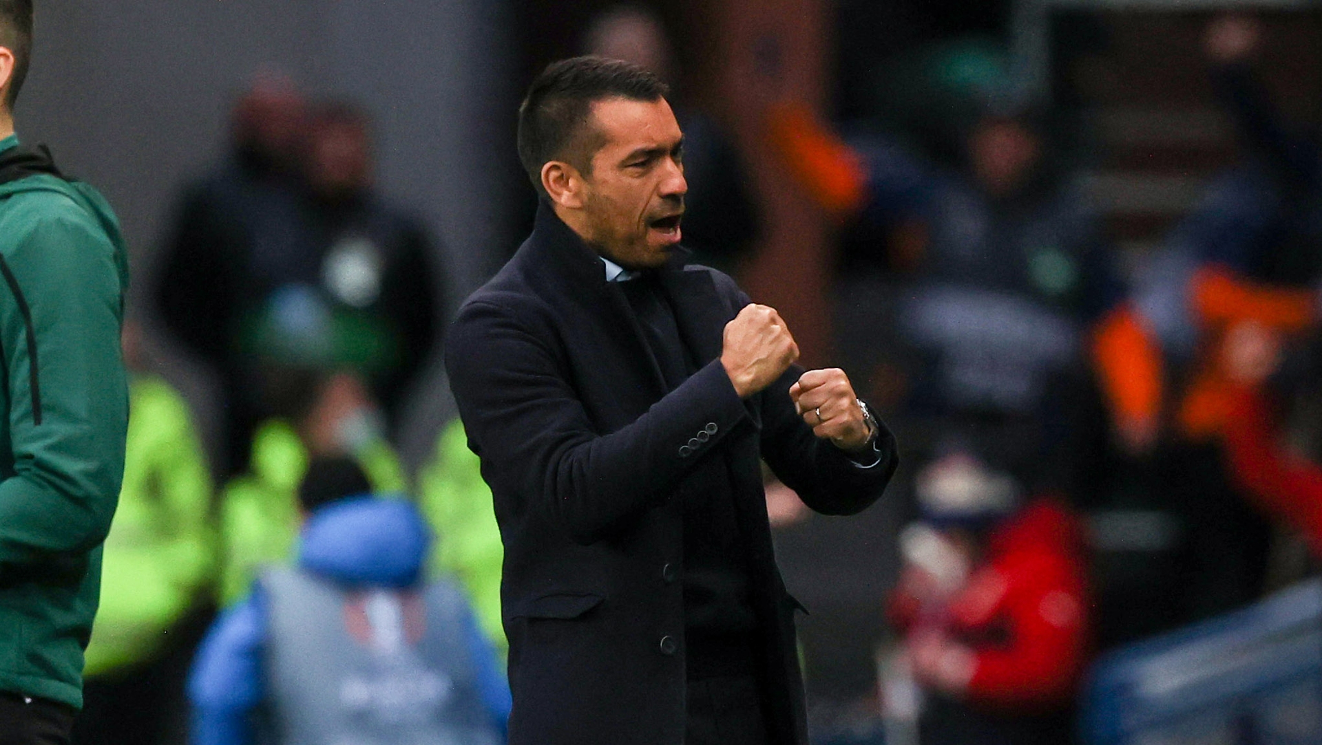 Giovanni van Bronckhorst celebrates a goal against Braga at Ibrox.