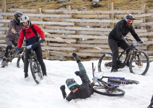 Incredible footage shows daredevil mountain bikers cycle down snow-capped Aonach Mor