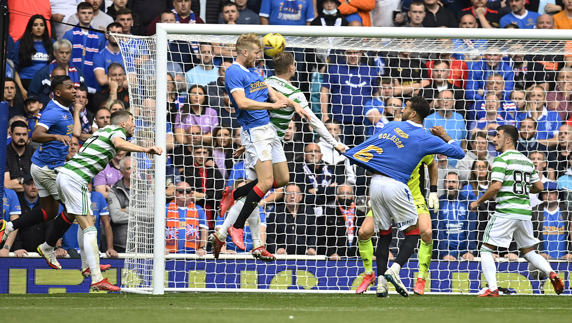 Rangers' Filip Helander heads past Joe Hart to settle the first Old Firm match of the season.
