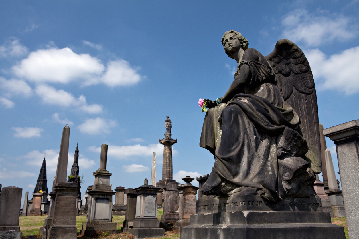 Necropolis: Angel statue in ancient cemetery.