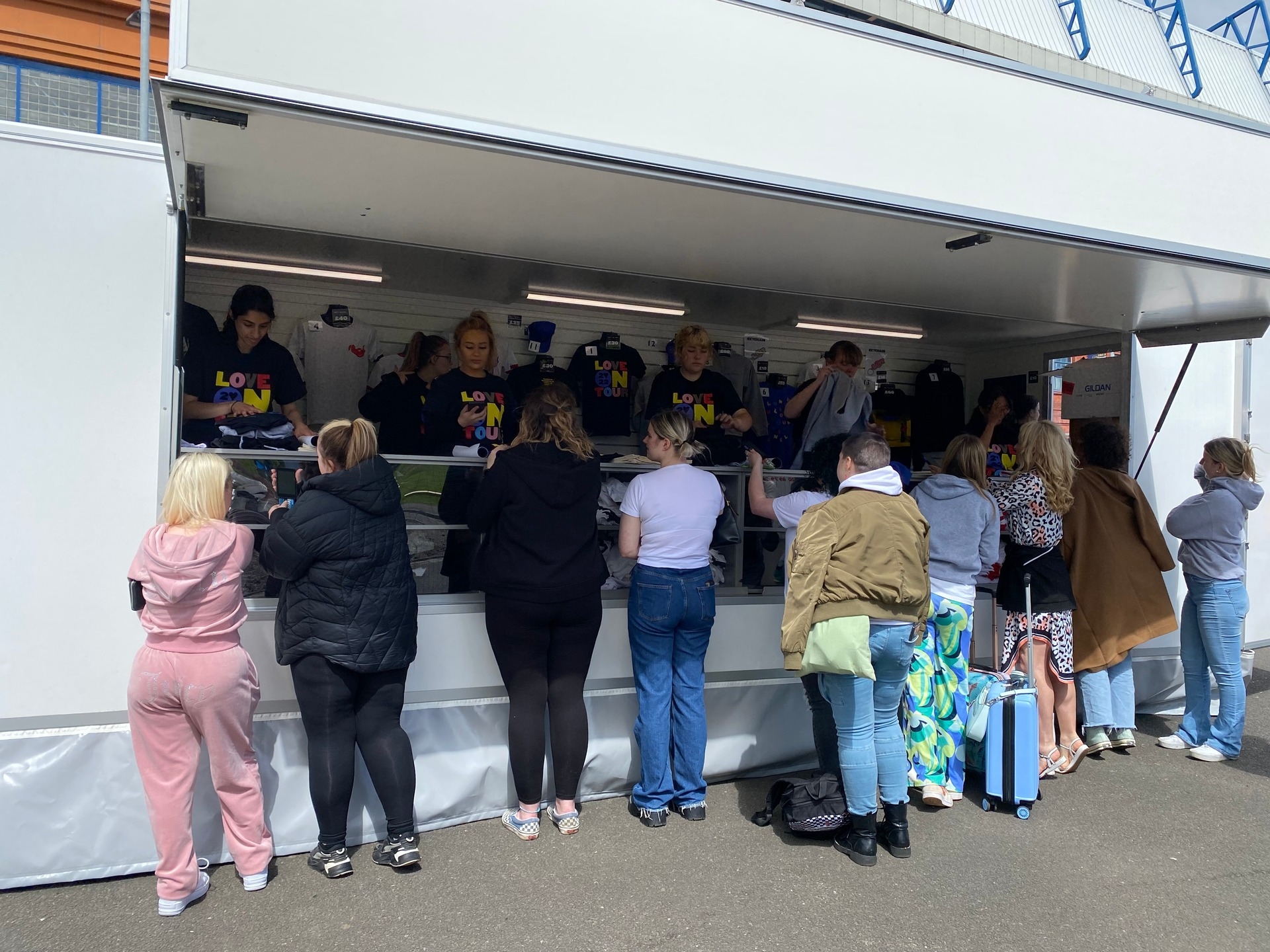 Fans have been spotted buying merchandise ahead of the concert. 