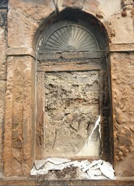 The headstone was destroyed by vandals in broad daylight. 