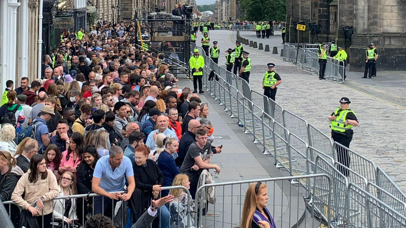 Crowds on Royal Mile before Queen Elizabeth II coffin arrives. September 11, 2022
