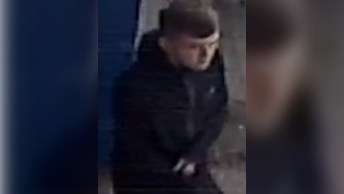 The second man was spotted wearing dark clothing and dark trainers.