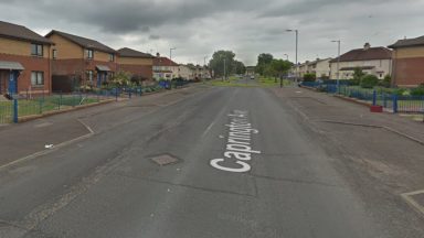 Attempted murder probe launched by Police Scotland after ten people set fire to a flat in Kilmarnock