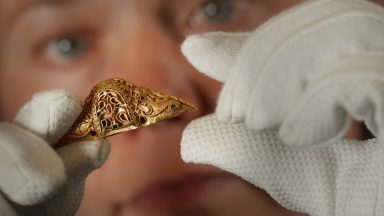 Gold sword decoration found by metal detectorist in Stirlingshire acquired by National Musuem’s Scotland