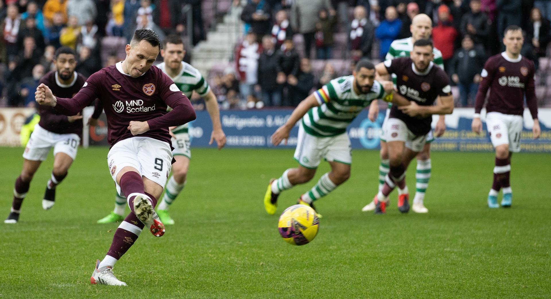 Penalty: Lawrence Shankland scores to make it 1-1.