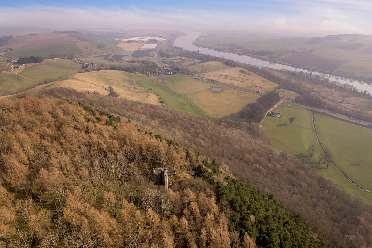 Binnhill Tower sits on a wooded hill near Kinfauns.