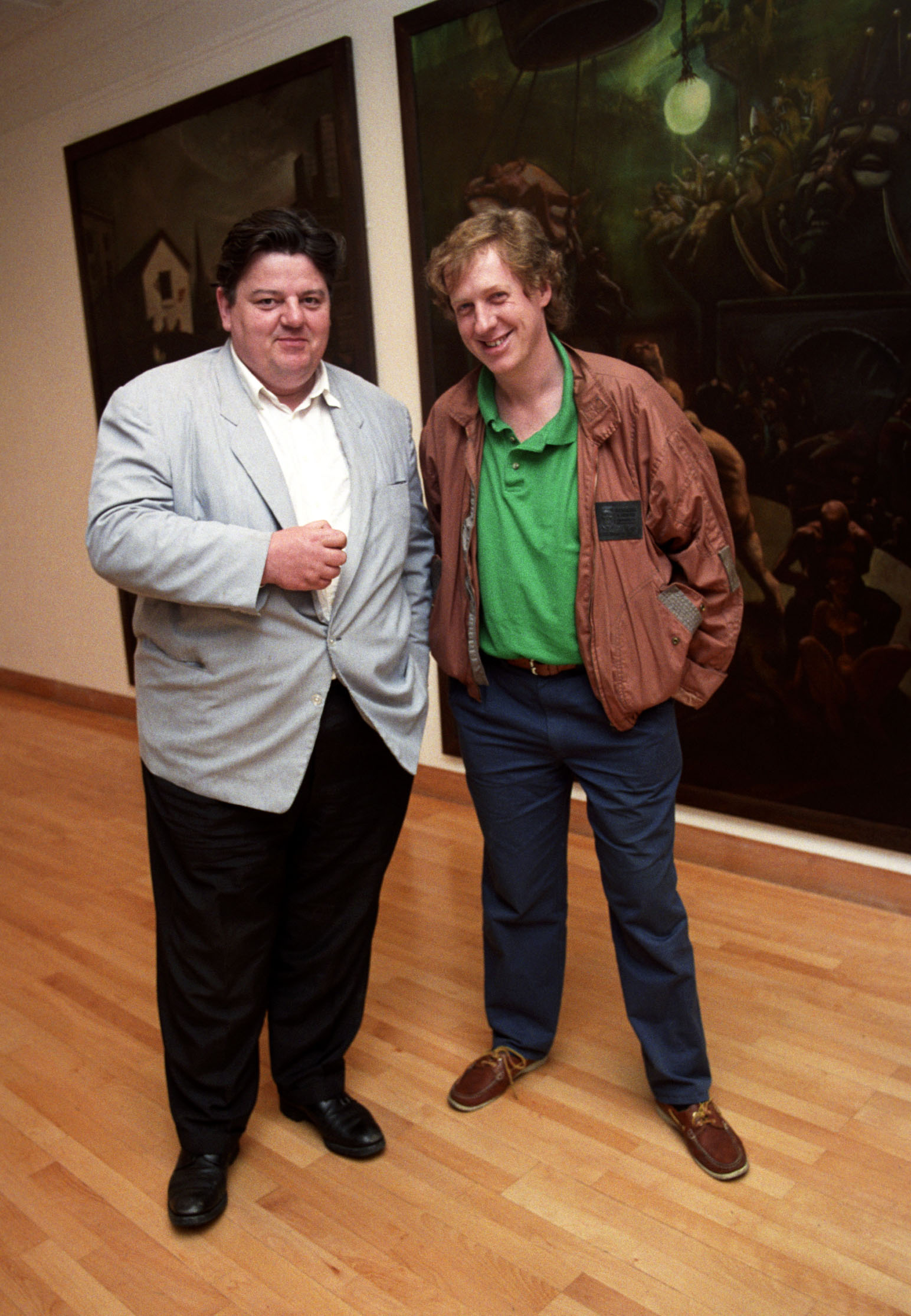 Robbie Coltrane pictured with Glasgow artist Peter Howsen in 1990.
