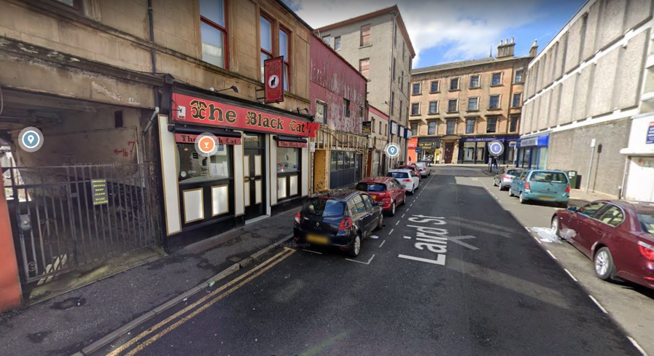 Two charged after man found seriously injured outside pub in Greenock