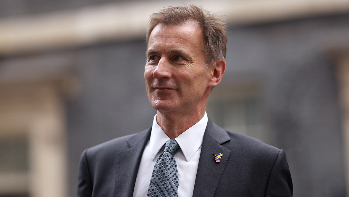 UK minimum wage will rise to at least £11 per hour, chancellor Jeremy Hunt confirms at Manchester conference