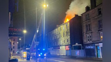 Five people rushed to hospital after fire tears through three-storey tenement in Edinburgh