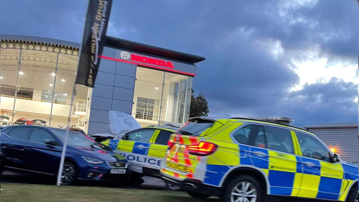 Man receives medical care after police car smashes into Honda dealership at Harbour Road, Inverness