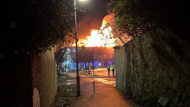 Sixteen fire crews tackle major blaze on town high street Poundstretcher store overnight in Leven