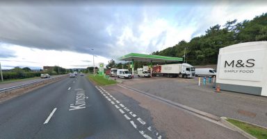 Man taken to hospital following two-vehicle crash near petrol station