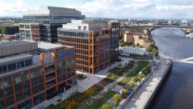 Extinction Rebellion break windows at Barclays offices in Glasgow city centre during protest