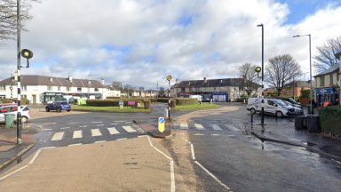 Man rushed to hospital and car found burnt out after attack in Edinburgh