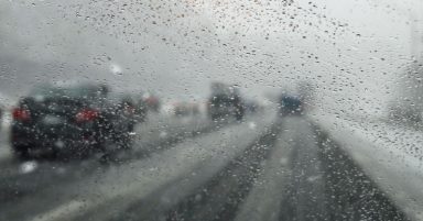 Bus and lorry collide on major road as wintry weather sweeps country 