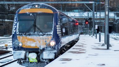 Tree falls on Aberdeen to Inverness railway as heavy snows causes travel disruption