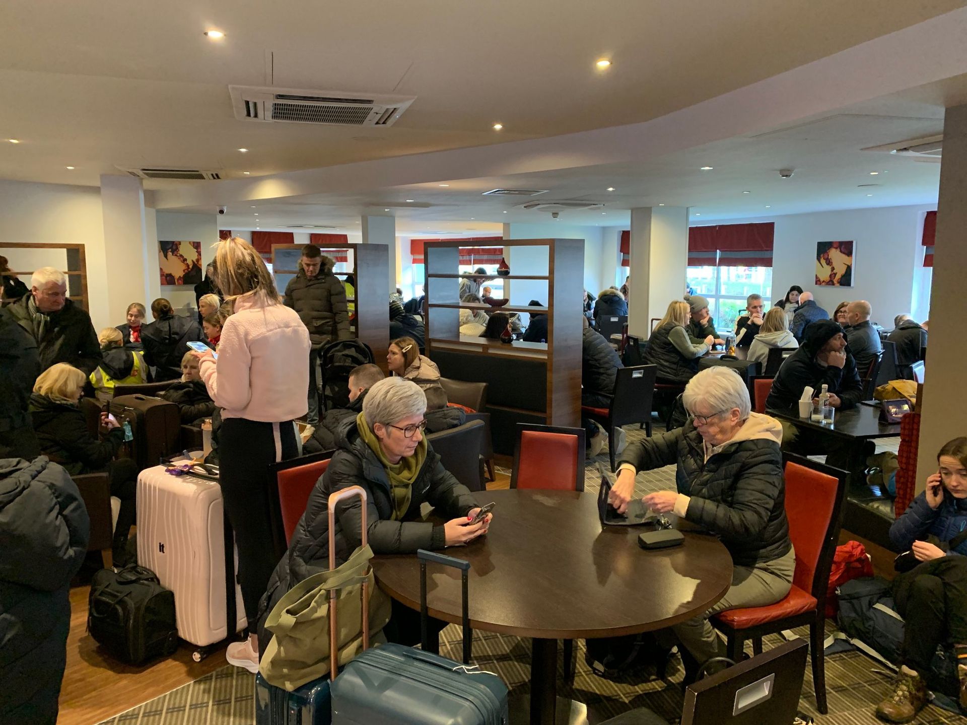 Crowds swarmed to a nearby Holiday Inn for warmth.
