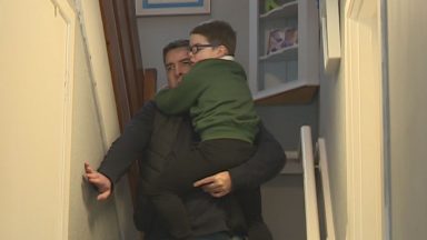Blind dad from Polmont, Falkirk, has to carry son with Duchenne muscular dystrophy down stairs