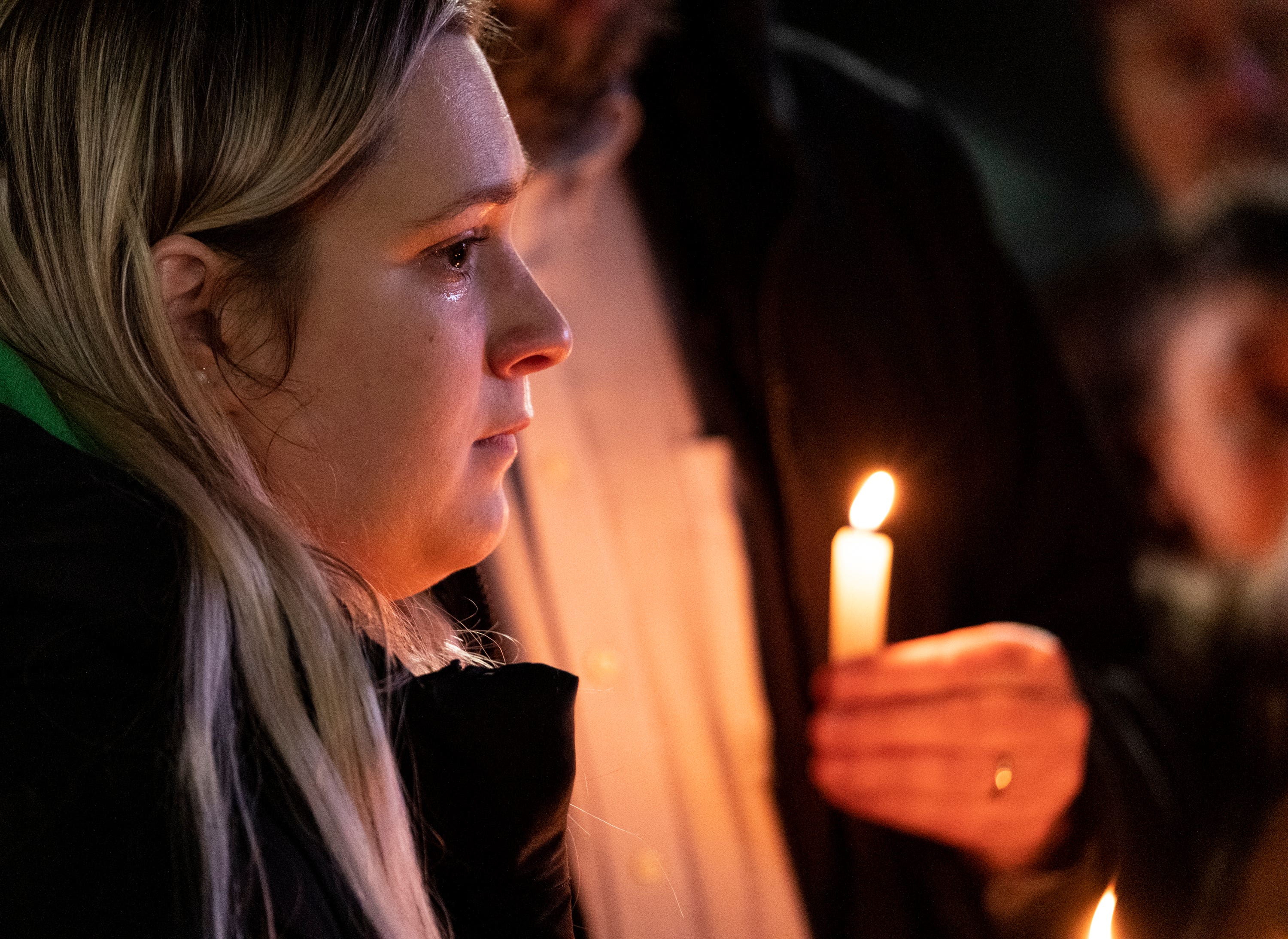 Rosalie List, a co-worker at Richneck Elementary, speaking at a vigil for Abby Zwerner.