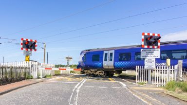 Man charged after ScotRail train and car collide on level crossing in Highlands between Inverness and Nairn