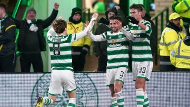 Greg Taylor on a high after finally hitting the net at a packed Celtic Park