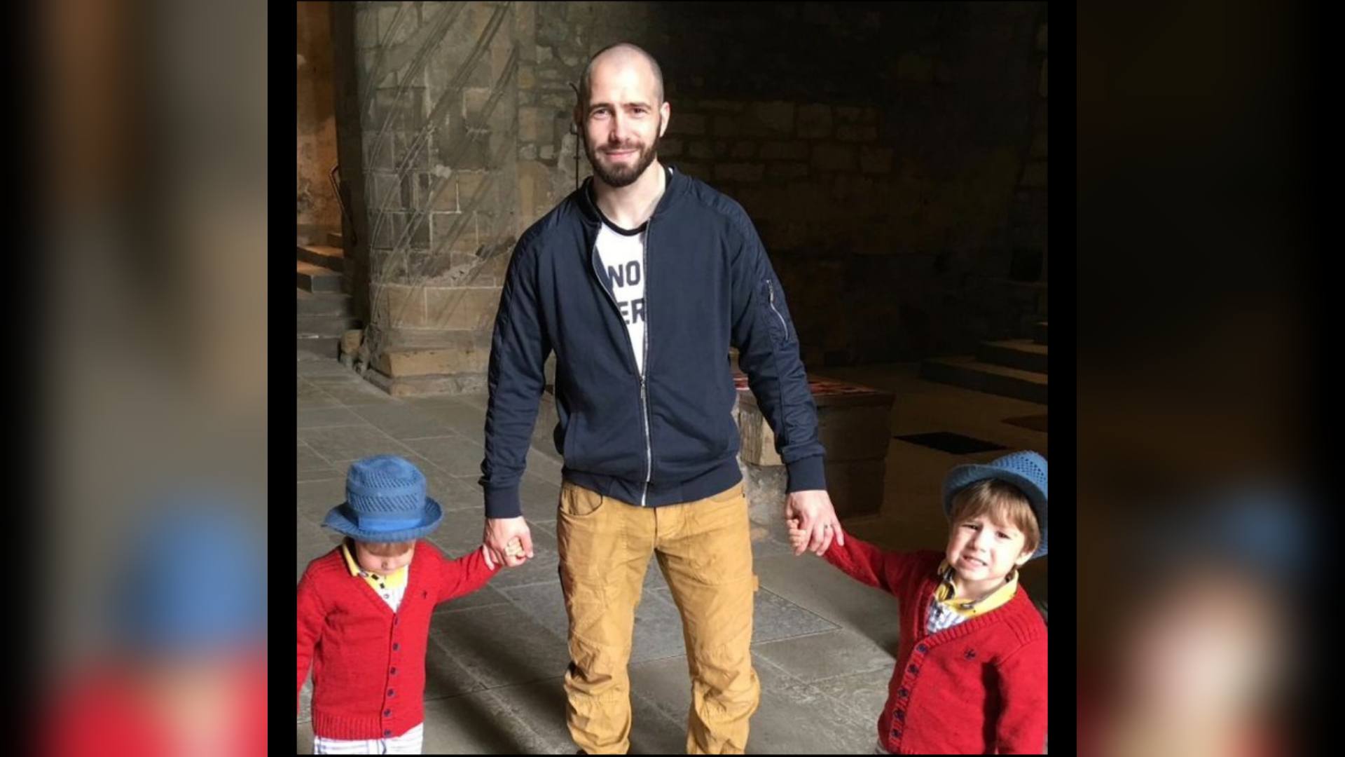 Barry Martin with his twin sons Oliver and Daniel.