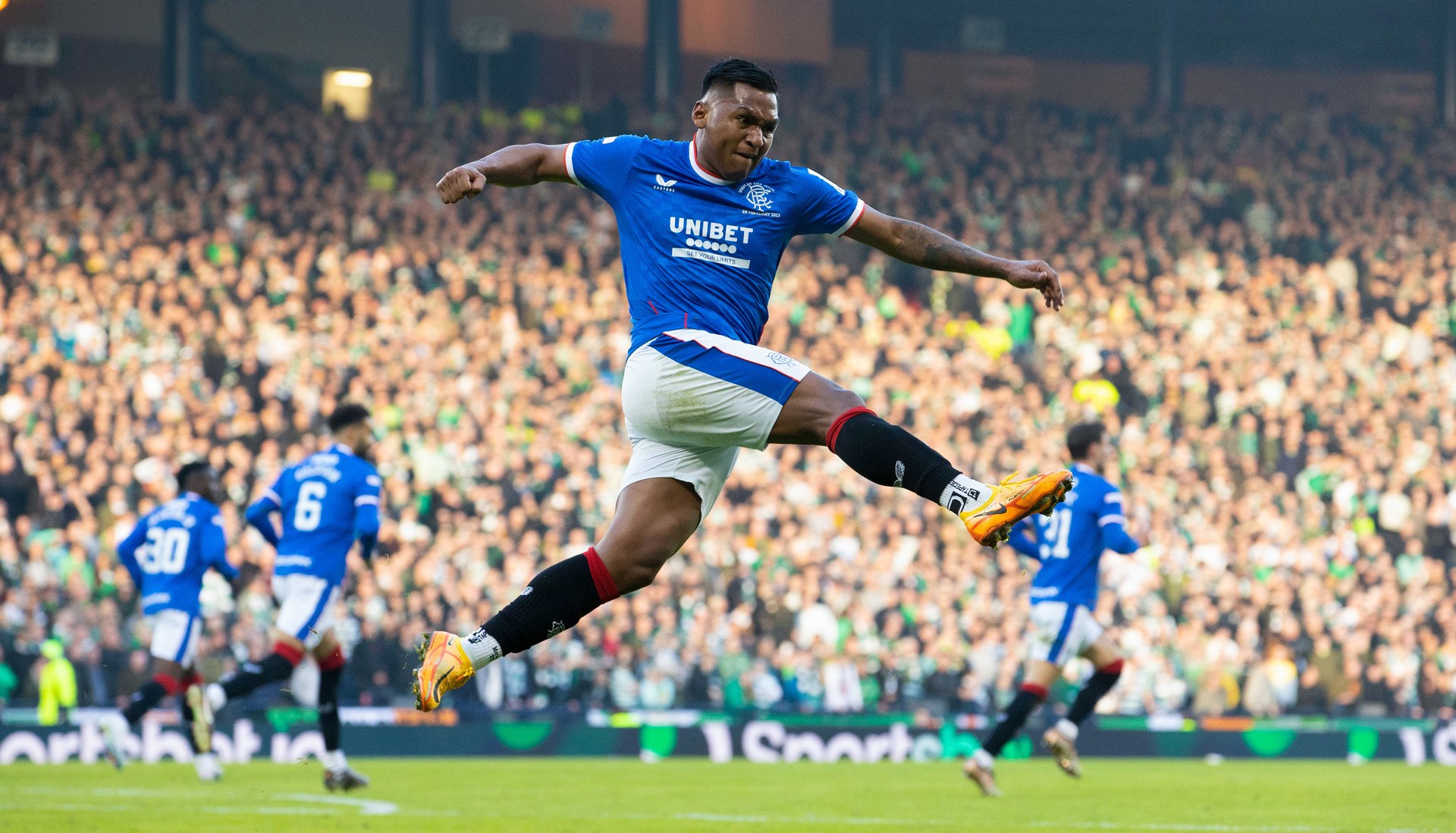 Alfredo Morelos celebrates pulling a goal back to make it 2-1.