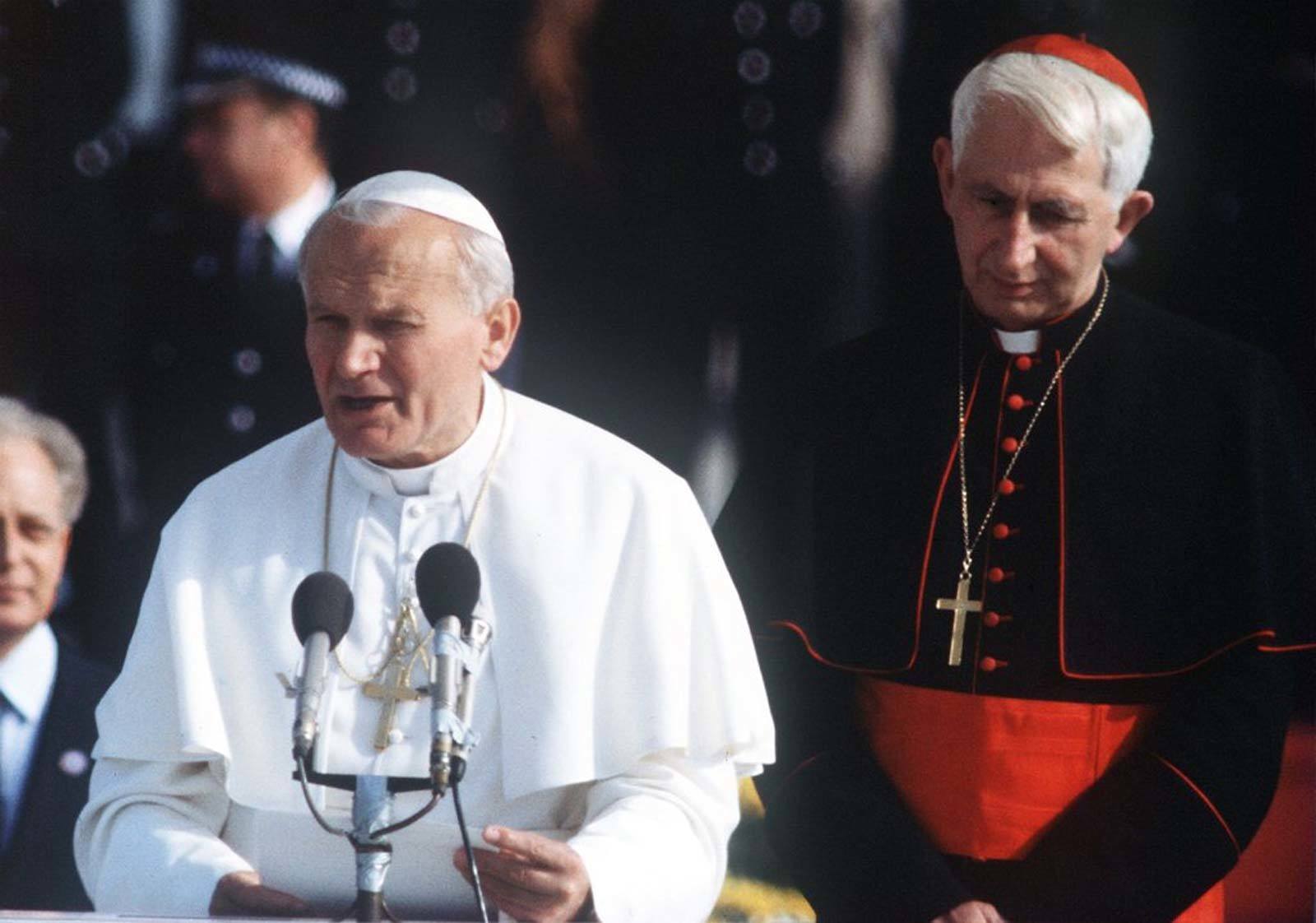 Pope John Paul II, left, makes a speech on his arrival at Gatwick Airport on the first day of his visit to Britain in 1982.