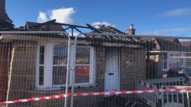 Man killed and woman in hospital after Falkirk house goes up in flames