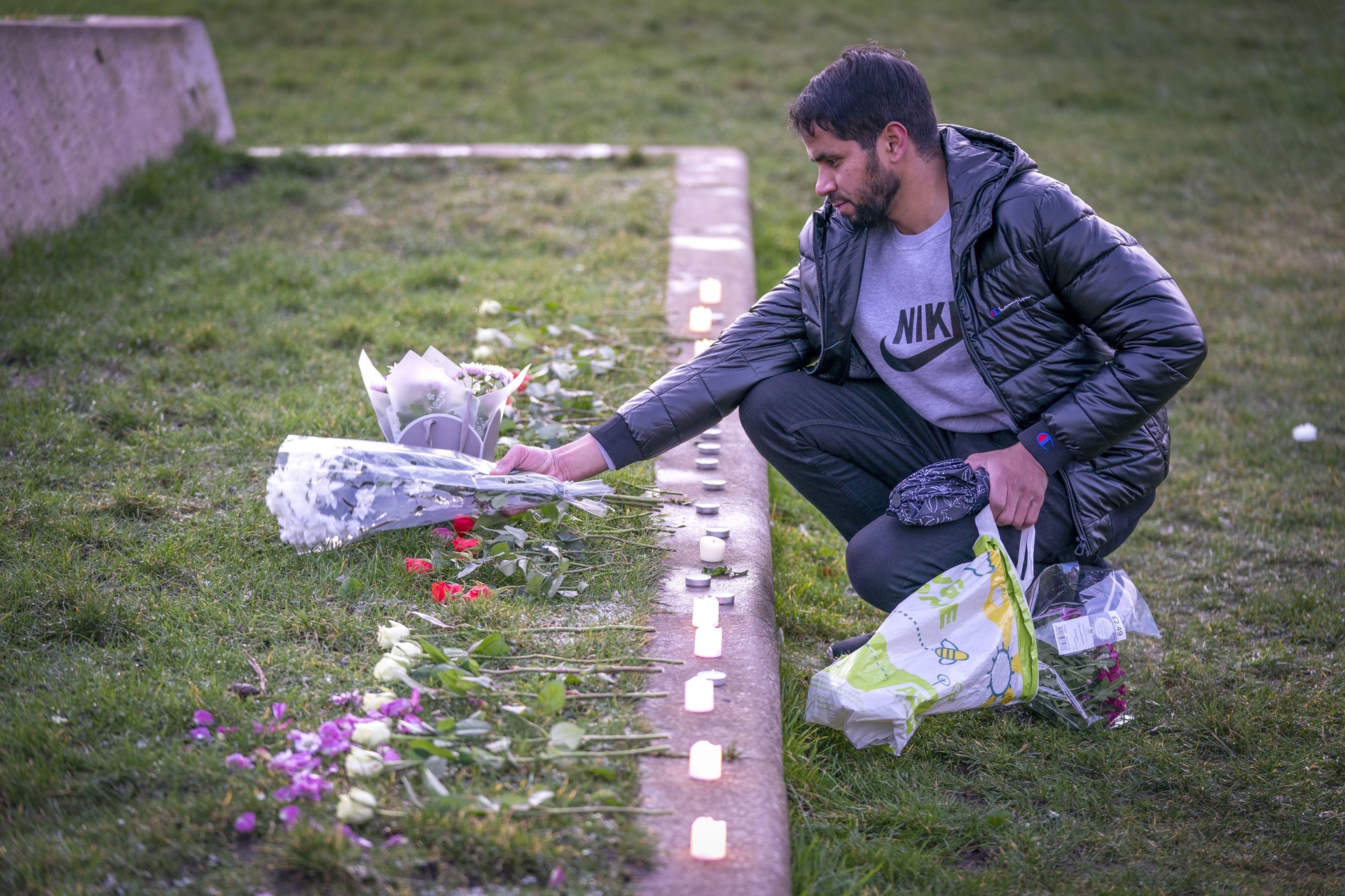 Adnan Hanif, uncle of Fawziyah Javed, lays flowers during a vigil held in honour of Fawziyah who died on Arthur’s Seat.<br>”/><cite class=cite>PA Media</cite></div><figcaption aria-hidden=true>Adnan Hanif, uncle of Fawziyah Javed, lays flowers during a vigil held in honour of Fawziyah who died on Arthur’s Seat.<br> <cite class=hidden>PA Media</cite></figcaption></figure><p>Mr Duguid said with the exception of a short period, as they were walking past the boarded Canongate entrance to the Scottish Parliament, they were “arm-in-arm”.</p><p>Police Sergeant Alastair Paisley, 41, a crime scene manager at the site of the incident, also gave evidence on the fifth day of the trial.</p><p>He told the court he estimated Ms Javed had fallen “between 40 and 50ft”.</p><p>Consultant forensic pathologist Dr Ralph Bouhaidar, told the court in evidence on Tuesday that Ms Javed died from complications of multiple injuries and a fall from height.</p><p>He detailed her injuries to the jury with the assistance of a three-dimensional model, which showed the areas of her body which were injured in the fall.</p><p>Sabeen Rashid, 43, a major crime analyst, also gave evidence, going through a 97-page telecoms report with advocate depute Alex Prentice KC.</p><p>Pictures from Arthur’s Seat were shown, timed between about 8.06pm and 8.30pm taken on the phone attributed to Ms Javed, which included selfies of herself and her husband.</p><p>The trial, before Lord Beckett, continues.</p><div class=