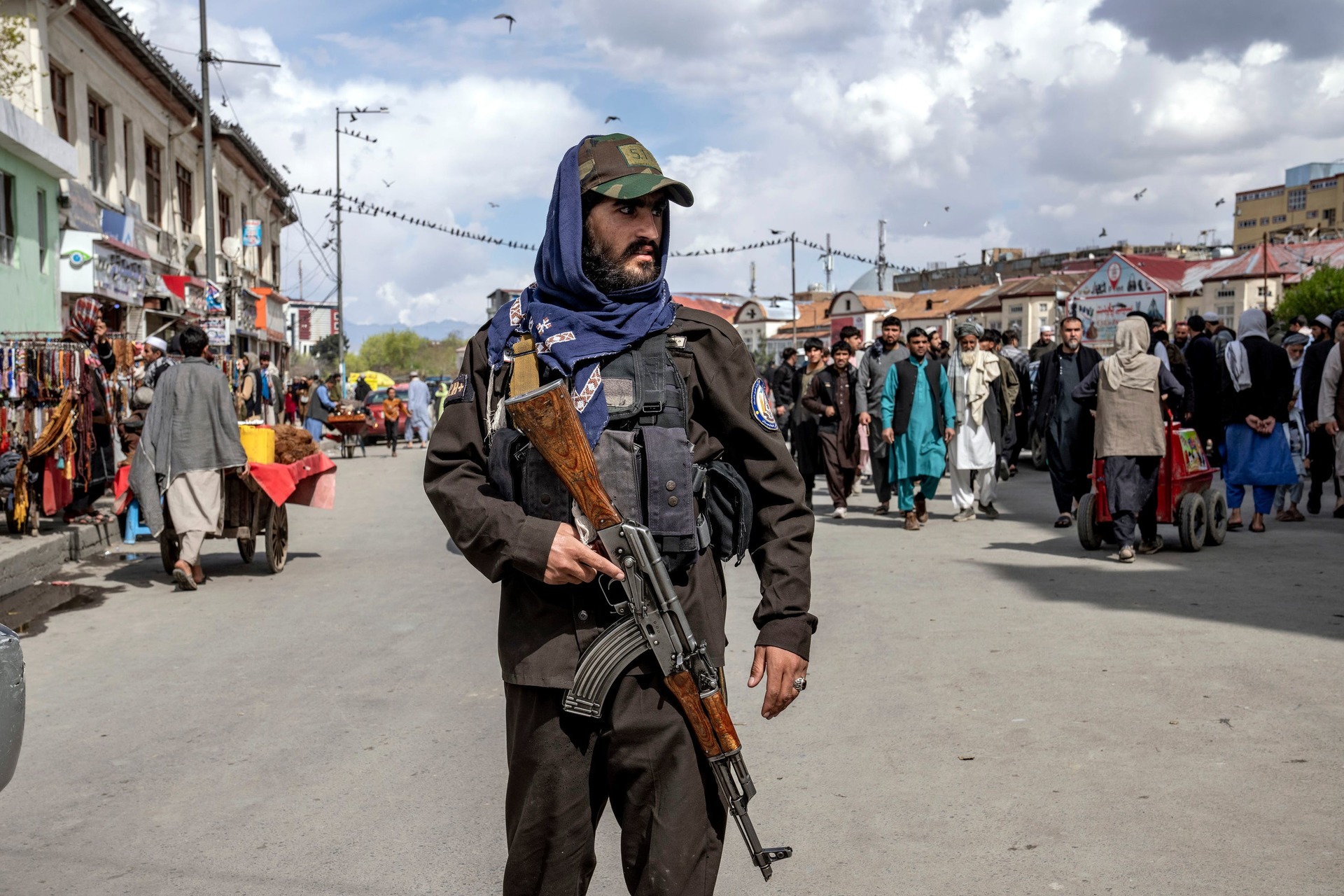 A Taliban stands guard in Kabul (Ebrahim Noroozi/AP)