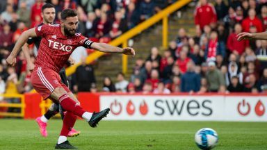 Aberdeen secure European place as Graeme Shinnie brace helps see off St Mirren