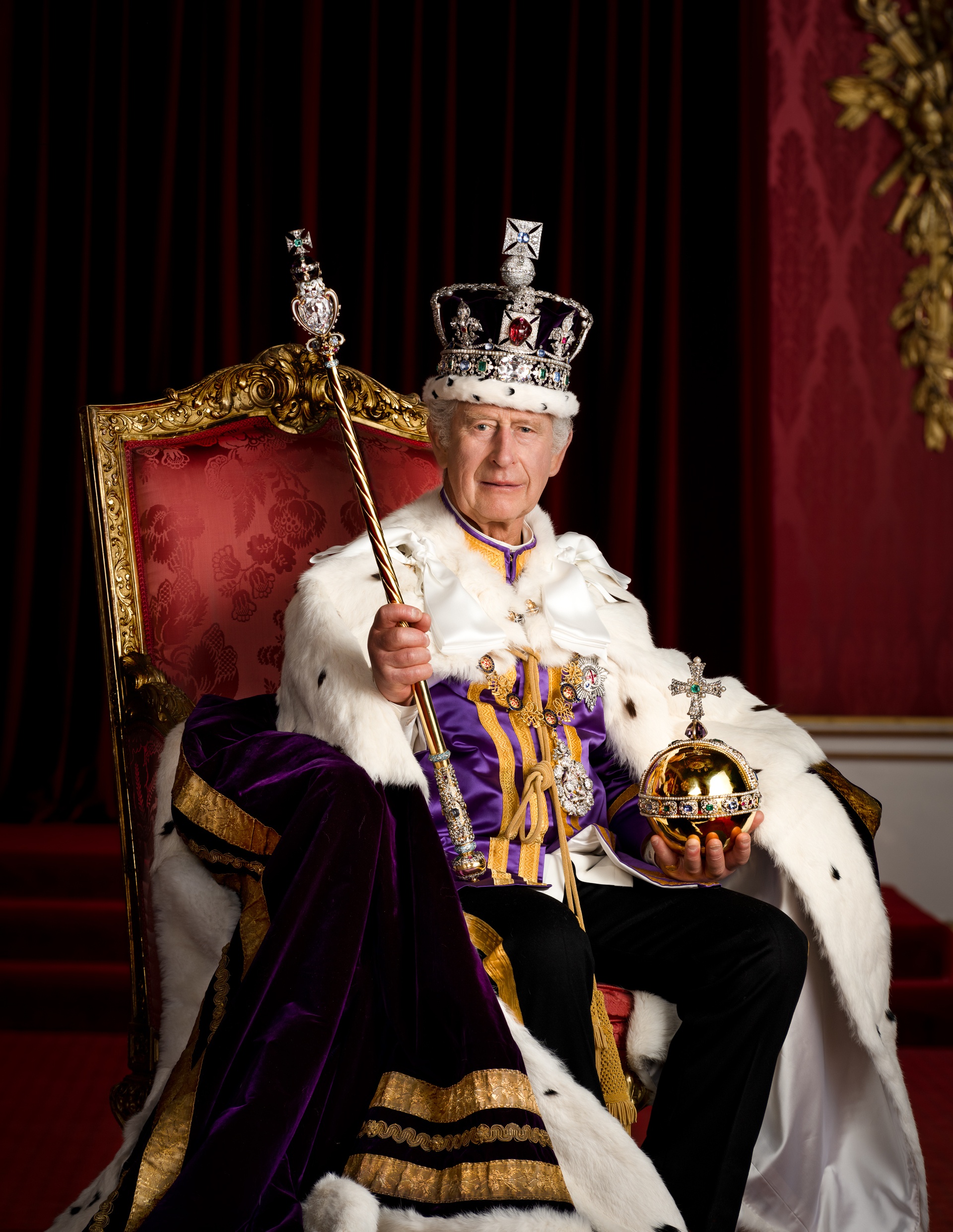 His Majesty King Charles pictured in full regalia in the Throne Room at Buckingham Palace.