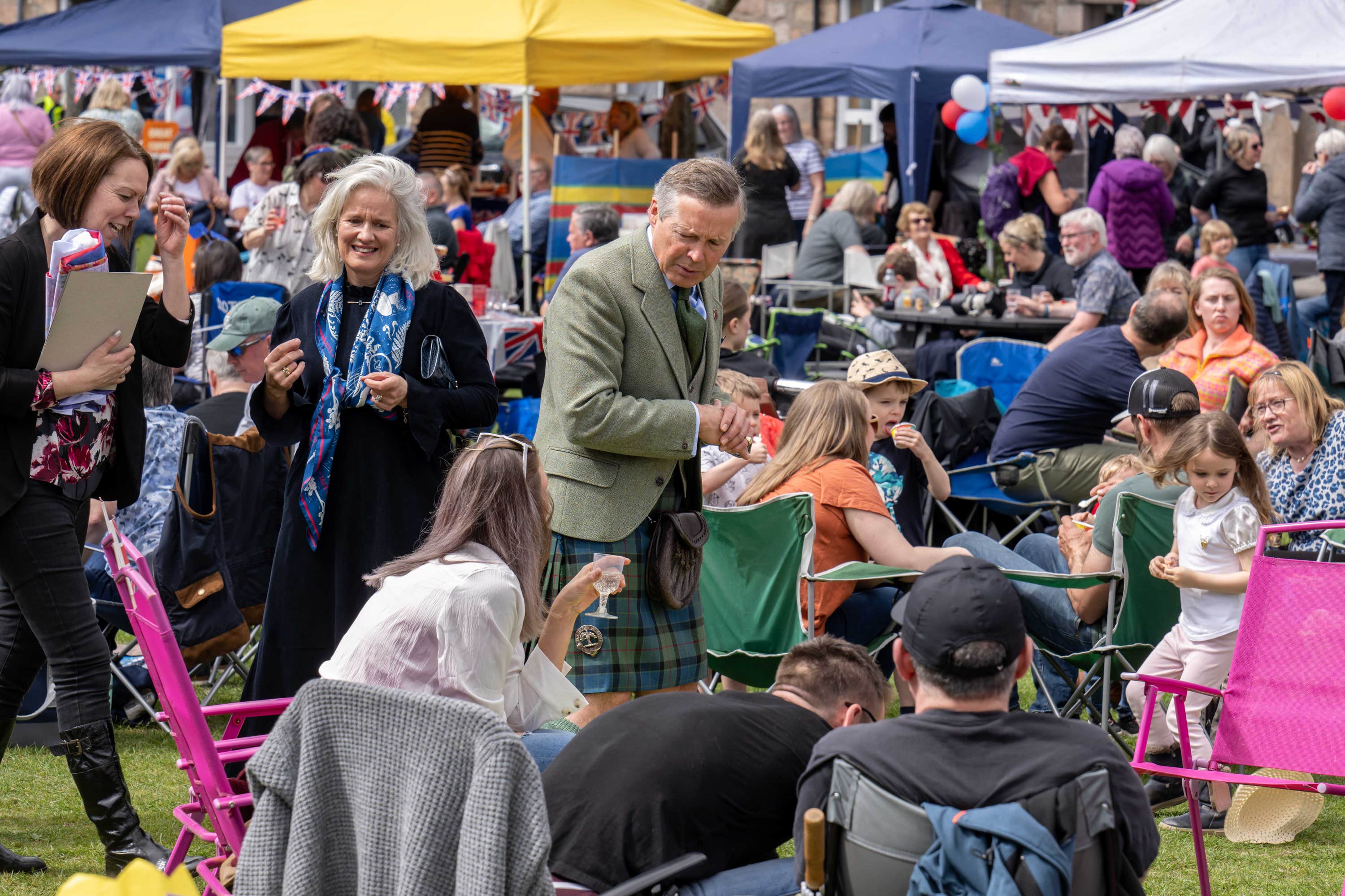 Sandy Manson, Lord-Lieutenant of Aberdeenshire, meeting party-goers at the Coronation Big Lunch in Ballater.