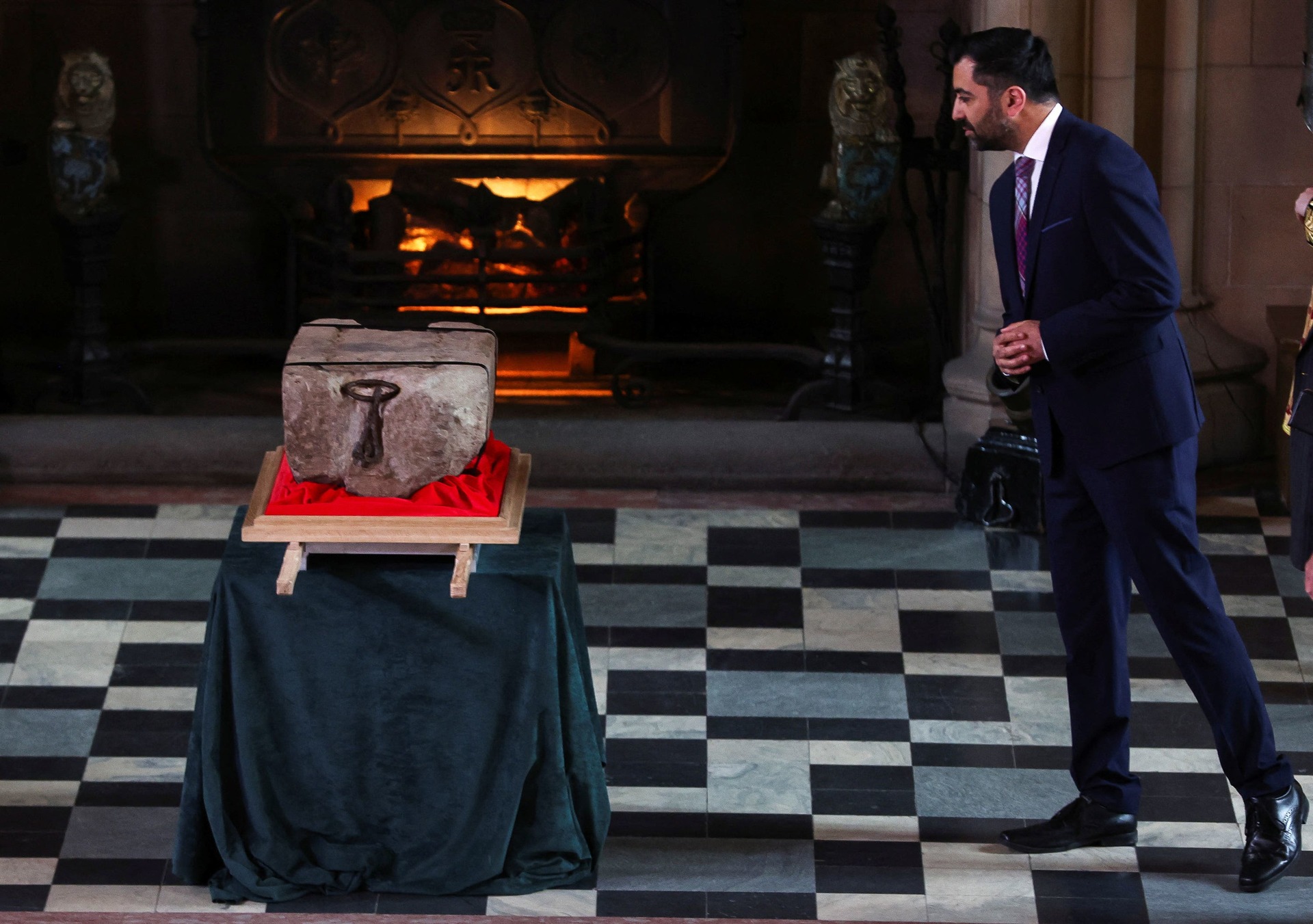 First Minister Humza Yousaf views the Stone of Destiny at Edinburgh Castle.