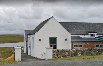 Joiner died after fall caused by ladder detaching from roof at former Bragar school on Lewis