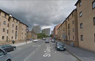 Investigation launched after body found in Glasgow city flat