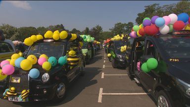 Taxis hit the streets are part of charity fundraiser
