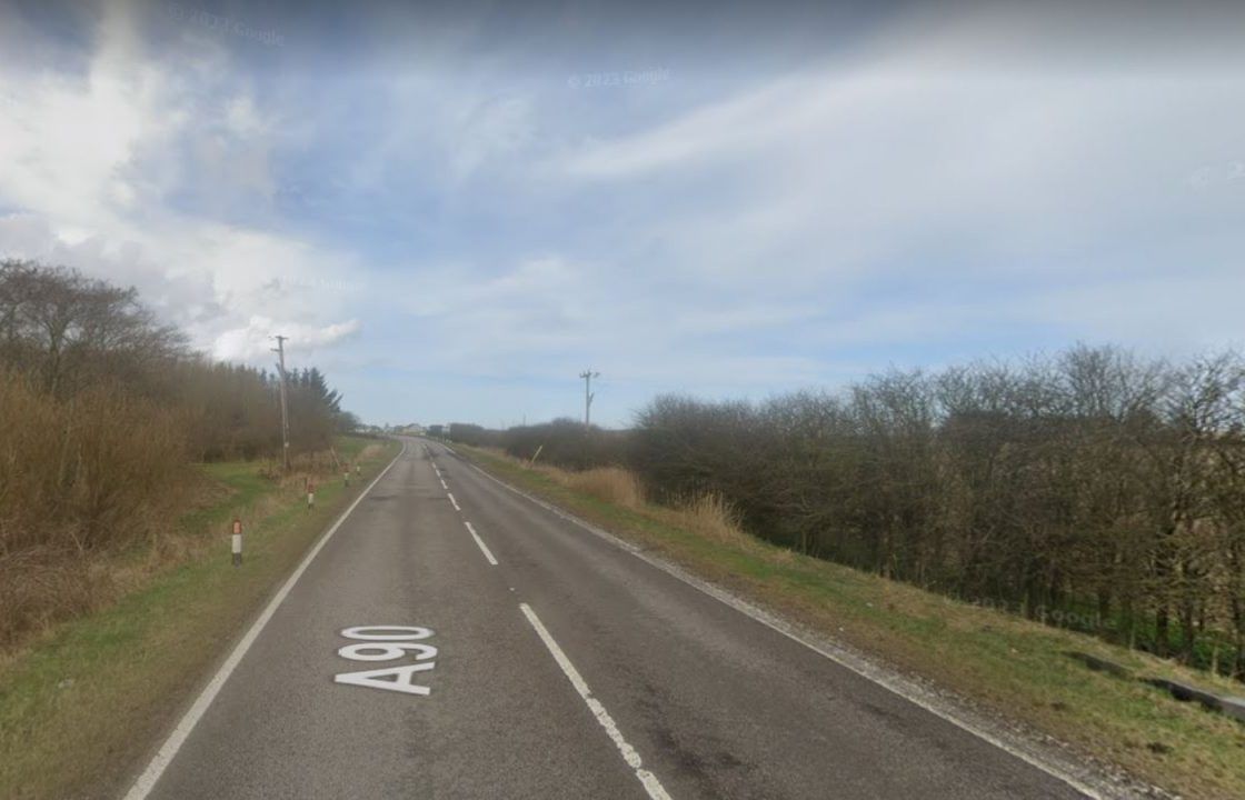 Man dies after A90 crash between car and van closes road