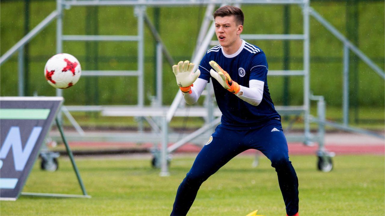 Norwich goalkeeper Jon McCracken joins Dundee on a season-long loan deal