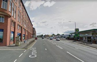 Two police officers in hospital after crash between van and car in Glasgow